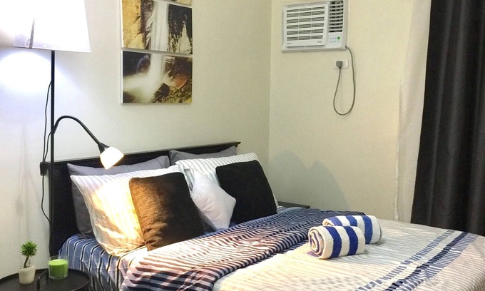 Phil-Am Apartamento | ESTUDIO cerca de MALLS y MRT STATION con WiFi y NETFLIX