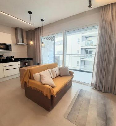 Centro Apartamento | Studio Xavante - novo, confortável, com garagem coberta e portaria 24h