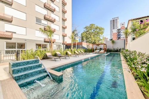 Partenon Apartamento | StudioLUX, Vaga Grátis, Piscina, Gym, NetFlix, ao lado da PUC