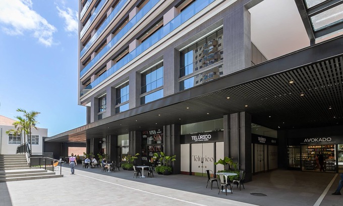 Centro Apartamento | Studios Tower - Building near the postcard with swimming pool in the center of Floripa