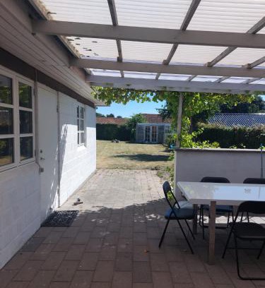 Odense Apartamento | Stuelejlighed med have og overdækket terrasse