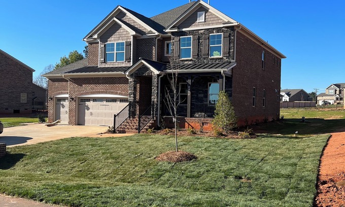 Stokesdale Casa | Stunning 4-bedroom spacious home with backyard and security in private community