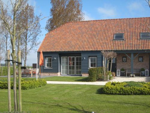 Zuidzande Casa | Stylish Holiday Home in Zuidzande with Sauna