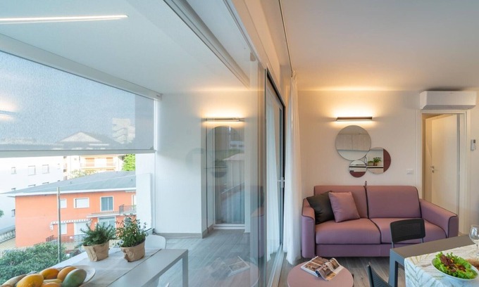 Lignano Sabbiadoro Apartamento | Apartamento moderno y elegante cerca del centro de Lignano