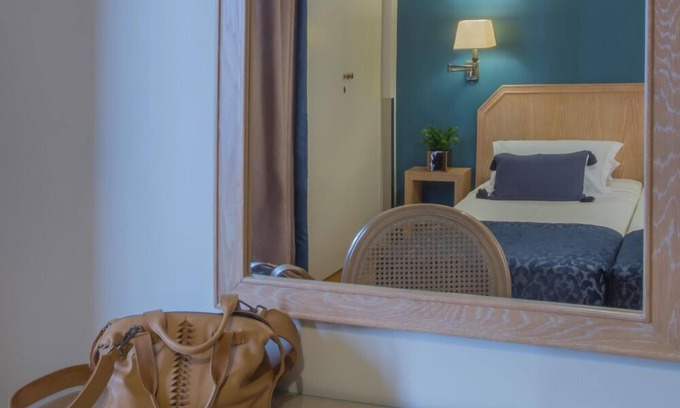 Ilisia Apartamento | Elegante apartamento con servicio para 3 en el corazón de Atenas.