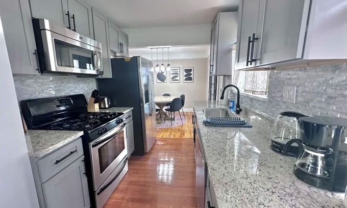 Clinton Township Casa | Stylish, Spacious, 4 TV's, Game Room w/ Bar and Lounge Area