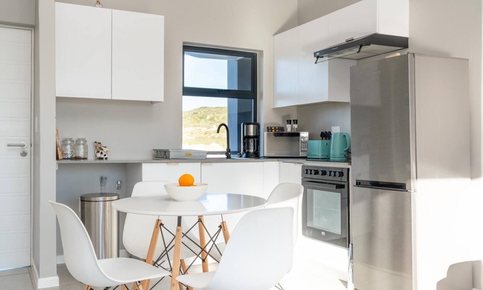 Mykonos Apartamento | Stylish Urban Stay | Balcony | Braai Area