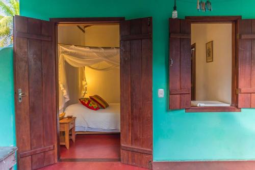 Caraiva Chalet De Esquí | Suíte Charmosinha
