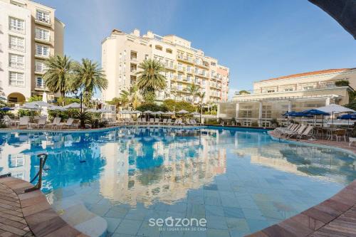 Jurere Complejo | Suíte com vista para praia dentro de hotel - Seazone ILCTOP