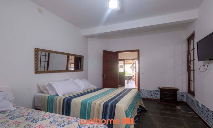 Itapua Casa | Suíte em Itapuã com piscina e acesso fácil à praia