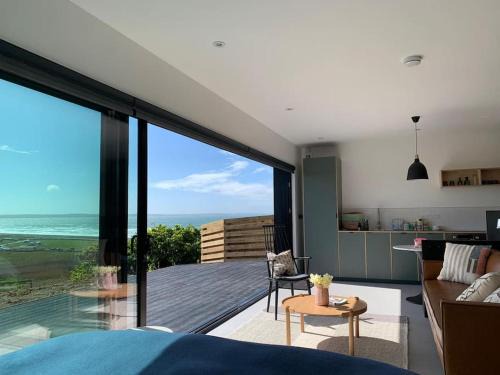 Penycwm Casa | Subterranean Studio with Panoramic Costal Views and Sauna