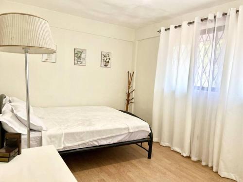 Dasmarinas Apartamento | Suite Dreams Staycation - Cozy 2-BR - Wi-Fi Garden Kitchen