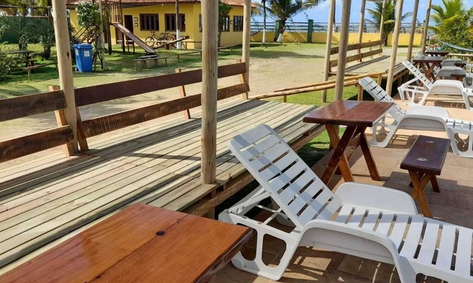 Canavieiras Apartamento | Suite on the seafront with air conditioning and crystal-clear swimming pool.