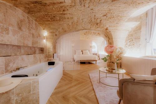 Ecusson Apartamento | Suite Vénusa - jacuzzi privatif - Hypercentre