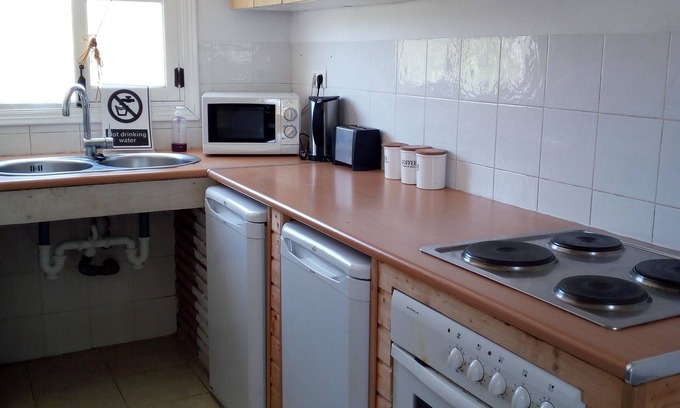 El Chorro Cama Y Desayuno | Habitaciones de Verano - Habitación Doble y Habitación Twin en Casa Olive Branch
