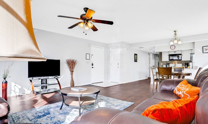 Royal Palm Bay Condominio | Sunflower-yellow condo with pool, W/D, hot tub & kitchen - dog/snowbird-friendly