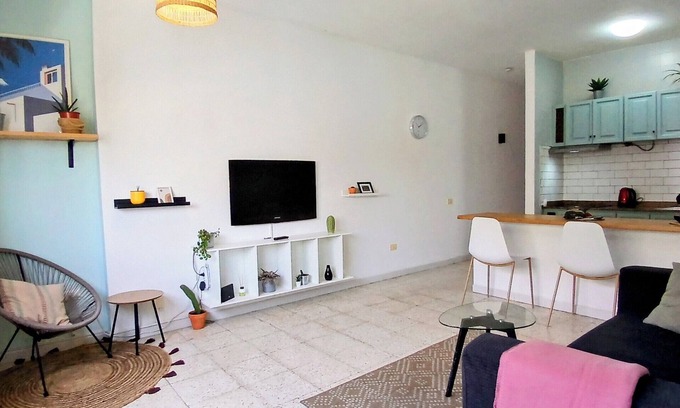 Puerto del Rosario Apartamento | Sunlit apt steps from beach! Cozy and modern. Walk everywhere. Perfect getaway!