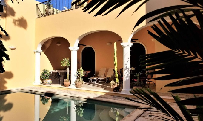 Costa Casa | Sunny, warm two-story colonial home located just one block from parque Santa Lucia,