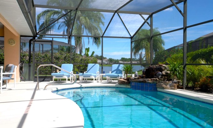 Sunset Lakes Villa | Sunset Retreat-Disney / Princess Rooms - Área de piscina ampliada / Cascada tropical
