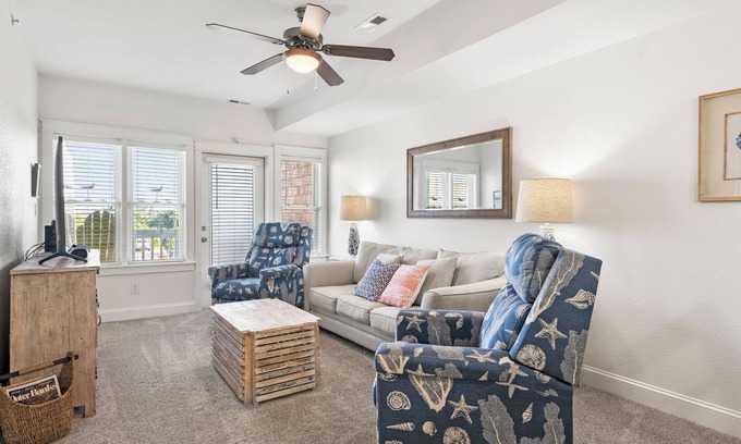 Nags Head Condominio | Sunset Sound: Se admiten mascotas, condominio de 2 dormitorios con una piscina comunitaria y espectaculares puestas de sol