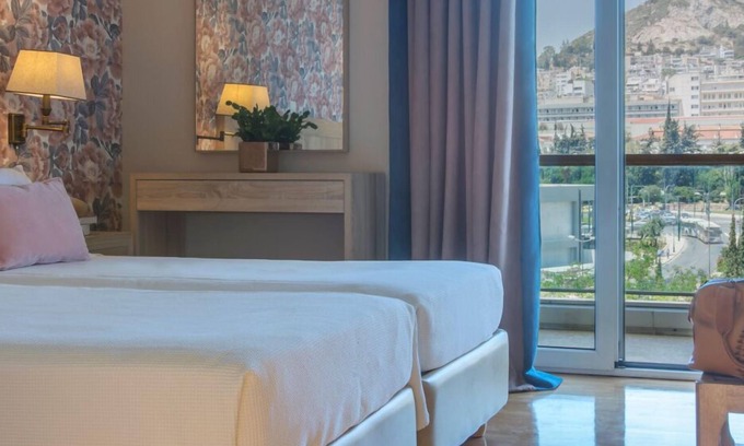 Ilisia Apartamento | Magnífico apartamento con servicio para 6 en el corazón de Atenas con vista a la colina de Licabeto