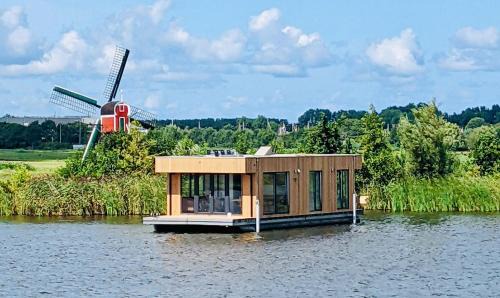 Oud Ade Alquiler De Eote | Surla houseboat "Aqua Zen" Kagerplassen with tender