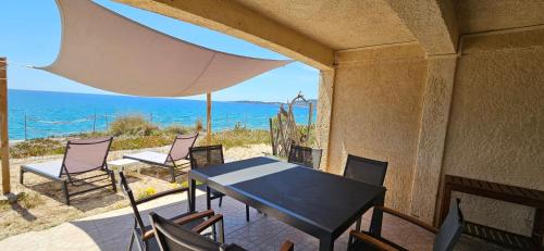 Olmeto Apartamento | T3 Paradisiaque sur la plage, les pieds dans l'eau