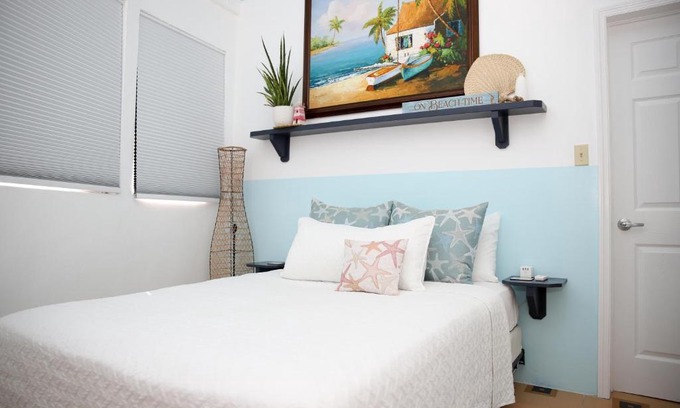 Nassau Apartamento | Tangerine Sunsets Castaway by the sea