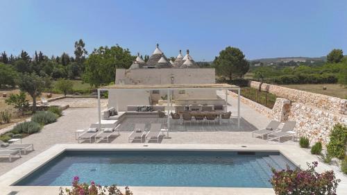 Martina Franca Villa | TD I Coni di Pinurè Trulli with Scenic Valley View