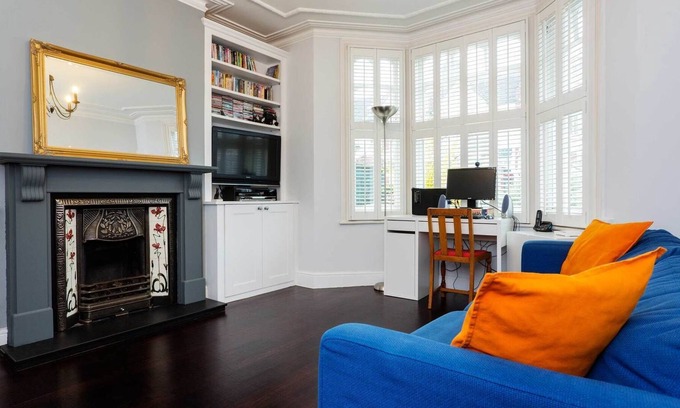 Wimbledon Park Casa | Encantador hogar inglés con hermosa chimenea y jardín en Wimbledon (Veeve)