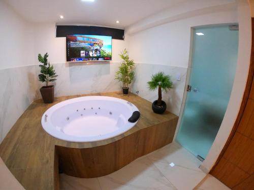 Maria Eugenia Apartamento | TH Flats 101 com Banheira de Hidromassagem