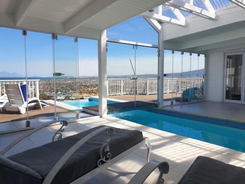 Mountainside Casa | 'The Bolussi Beachhouse', sleeps 12 in 6 en-suite bedrooms with Indoor Pool
