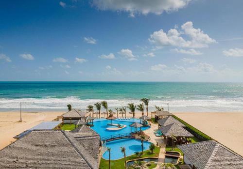 Trairi Casa | The Coral Resort - Loft na Praia de Flecheiras