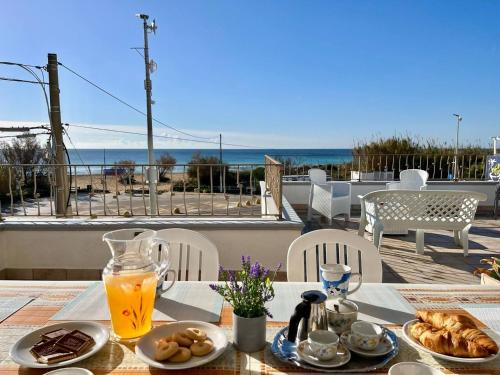 Posto Vecchio Apartamento | The Front Beach Penthouse 20 m by Salento Prime