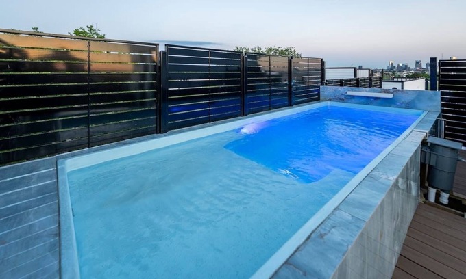Katie Hill Neighborhood Casa | NEW HOME - Luxe Skyline Views - 20' Heated Rooftop Pool