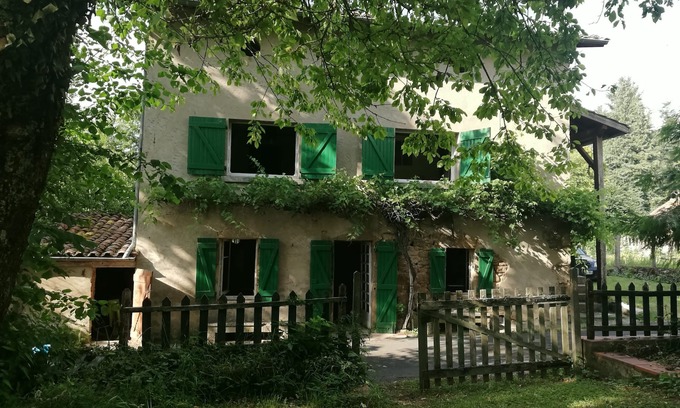 Chameane Casa | The house with the green shutters