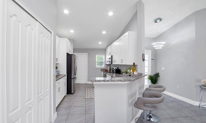 Poinciana Casa | THE MODERN OASIS - SPACIOUS 4 BDRM VACATION HOME. MINS. FROM DISNEY.