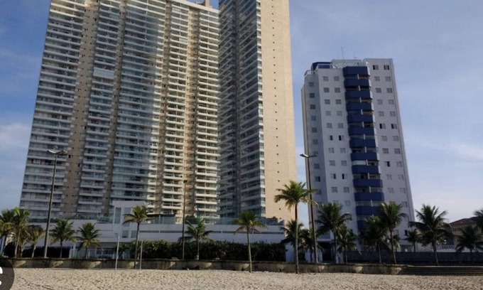 Mirim Apartamento | Single foot in the sand with gourmet balcony