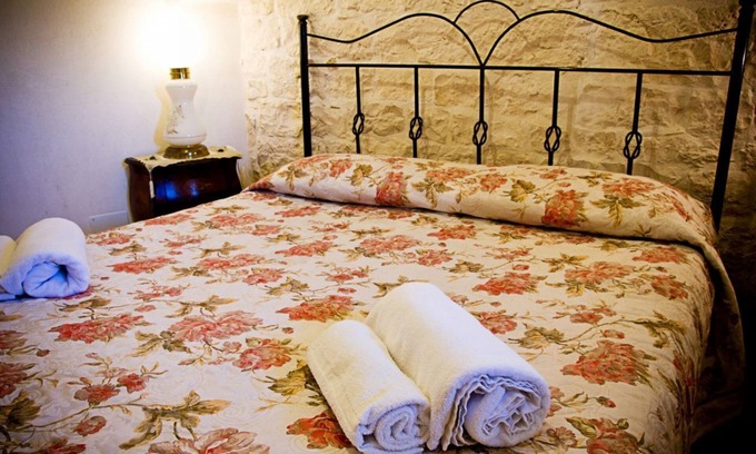 Martina Franca Casa | Il Panoramico: 1800s trullo house with vineyard and Itria Valley views