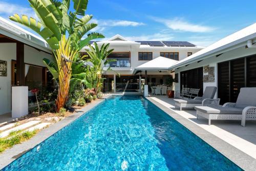 Trinity Beach Casa | The Peony Isle - Luxe Lakeside Haven with Pool & Spa