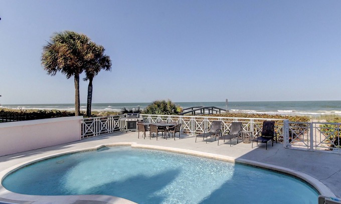 Belleair Beach Casa | The Pink Palace- Gulf front townhouse with private pool & large patio, sleeps 12