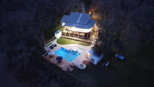 Cedar Lane Casa | The San Bernard River waterfront provides private access to a spa, boat ramp, and jet skiing