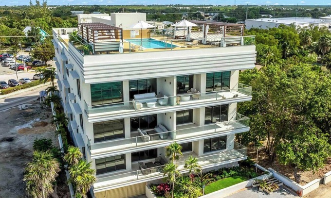 West Bay Condominio | The Sands #3: New 7 Mile Beach Condo w/Rooftop Pool + Designer Interiors