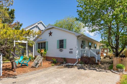 Caine Woods Casa | The Seashell Cottage