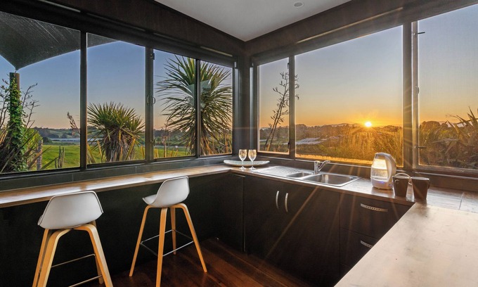 Tasman Apartamento | El estudio con vistas al agua.