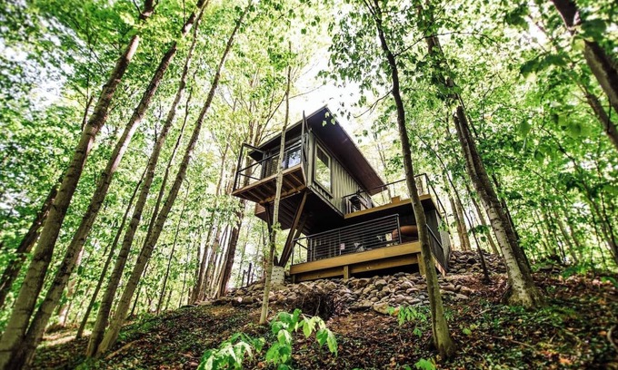 Charlevoix Casa | The Treehouse escape is set amidst 55 acres of natural beauty