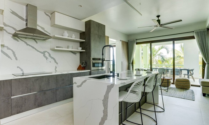 Cocoplum Condominio | The Villas at Cocoplum 'Ocelot' Apartment 122