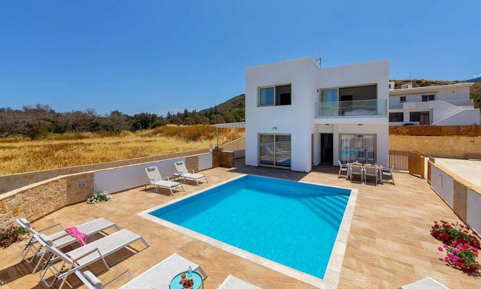 Pomos Casa | This fantastic, air-conditioned beachfront property is a perfect getaway for holiday makers wanting