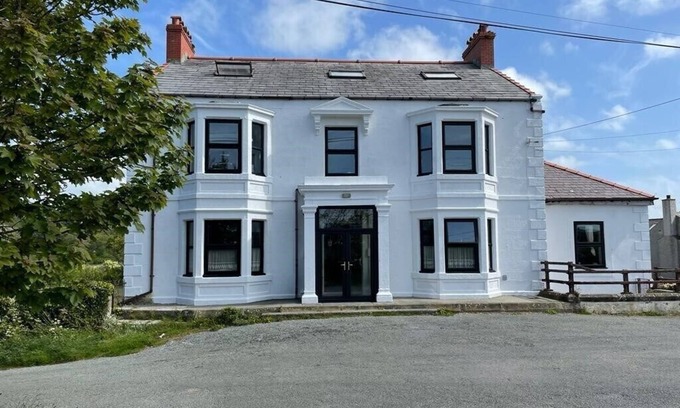Bodorgan Casa | This historic, former public house has been transformed into a superb holiday residence for 13