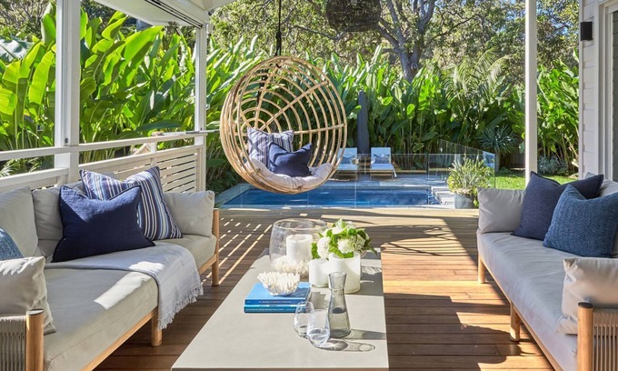 Palm Beach Casa | This home matches quaint beachside charm with luxurious comfort.